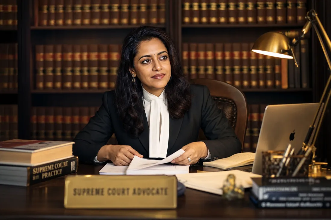 Ramneek Kaur reviewing legal documents in her chambers